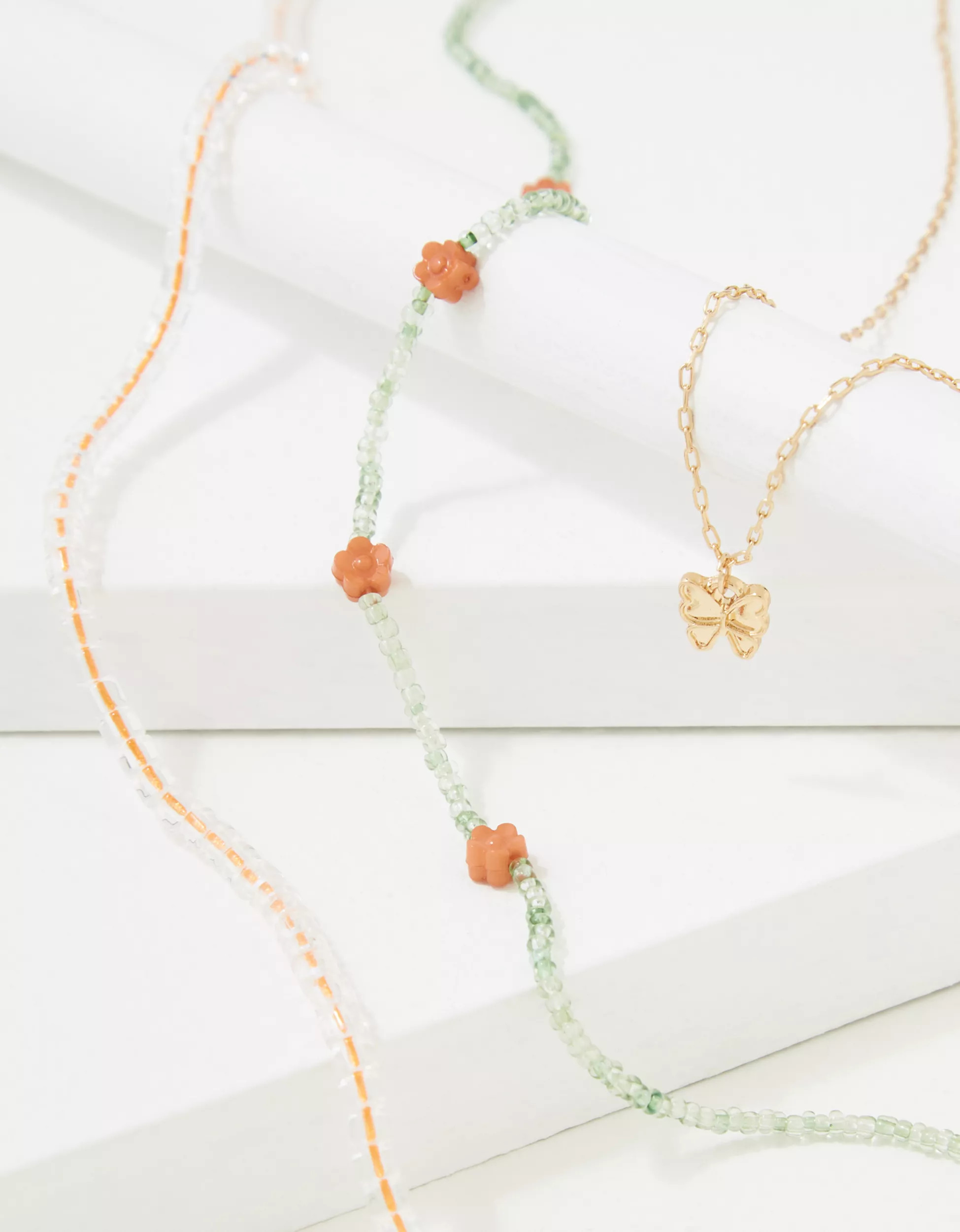 AEO Daisy + Butterfly Necklace 3-Pack | American Eagle Outfitters (US & CA)