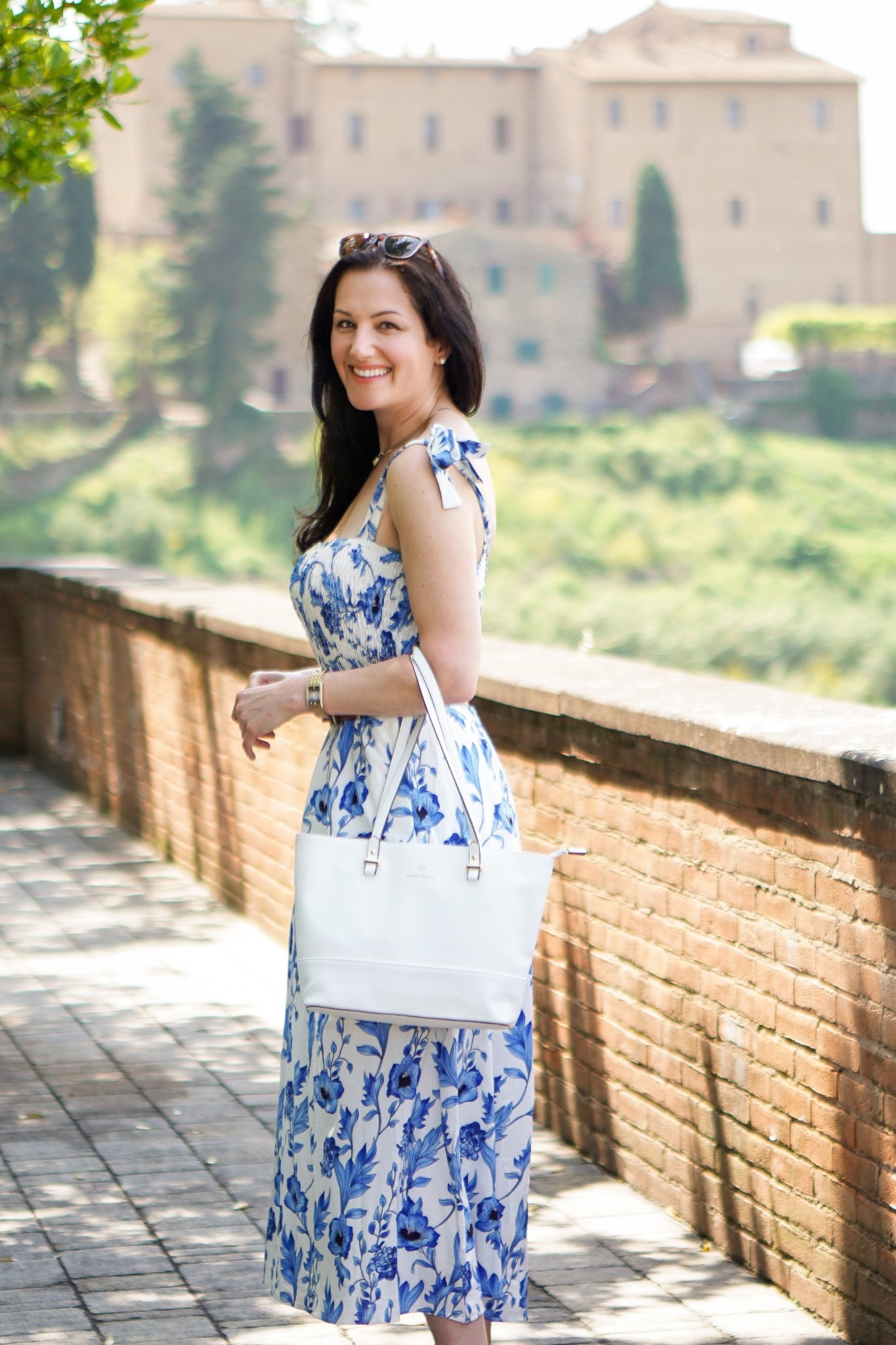 Perfect for European vacations in Italy, the French Riviera, or Portugal, this charming blue-and-white floral dress with a belted waist and breezy silhouette is great for sightseeing, brunch, garden parties, and warm-weather travel. If you’re planning what to wear on a European vacation, spring getaway, or summer trip, this elegant midi dress offers polished, romantic style for effortless day-to-night outfits. 

#LTKSeasonal #LTKTravel #LTKootd