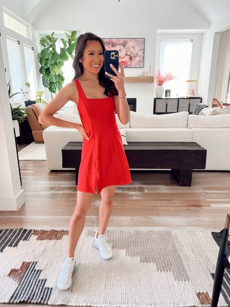 Red athletic mini dress paired with sneakers for a classic look! Love this color and this dress for athleisure, summer and more. Wearing size XS and it fits TTS. On sale for 20% off with an additional 15% off with code DRESSFEST! 

#LTKSaleAlert #LTKActive #LTKStyleTip