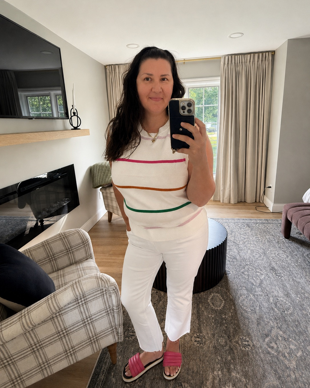 These white cropped jeans + colorful striped sweater tank are such a cute combo!

#LTKOver40 #LTKMidsize #LTKTravel