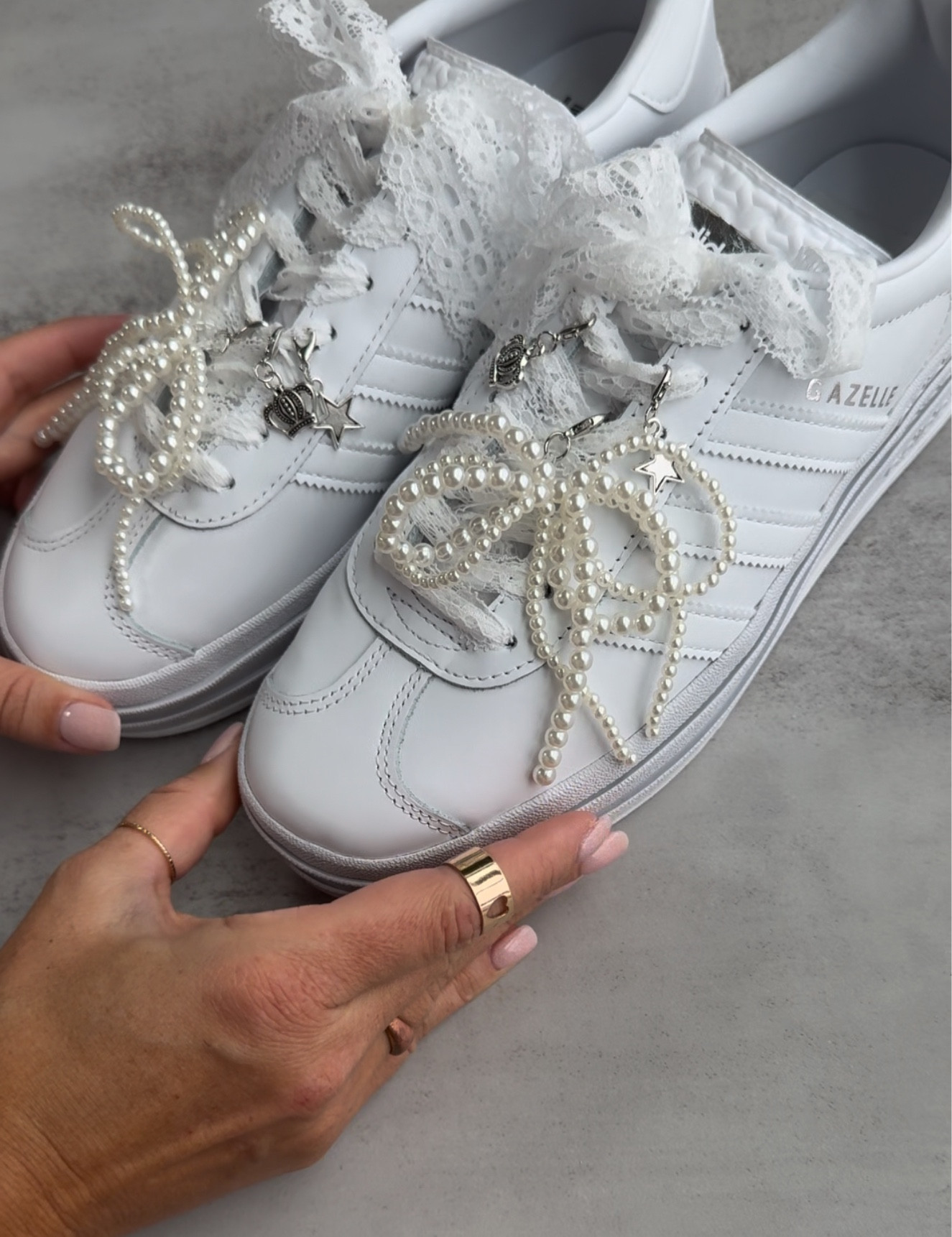 Adidas white gazelle | white sneakers | sneakers with platform | sneakers with charms 

#LTKShoeCrush #LTKStyleTip #LTKGiftGuide