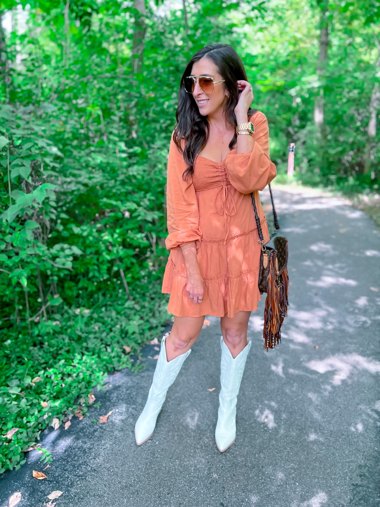 BoHo mini dress. Baby doll style. Multi tear. Cowboy boots. Aviator sunglasses. Bo ho bag.￼

#LTKstyletip #LTKshoecrush #LTKunder100