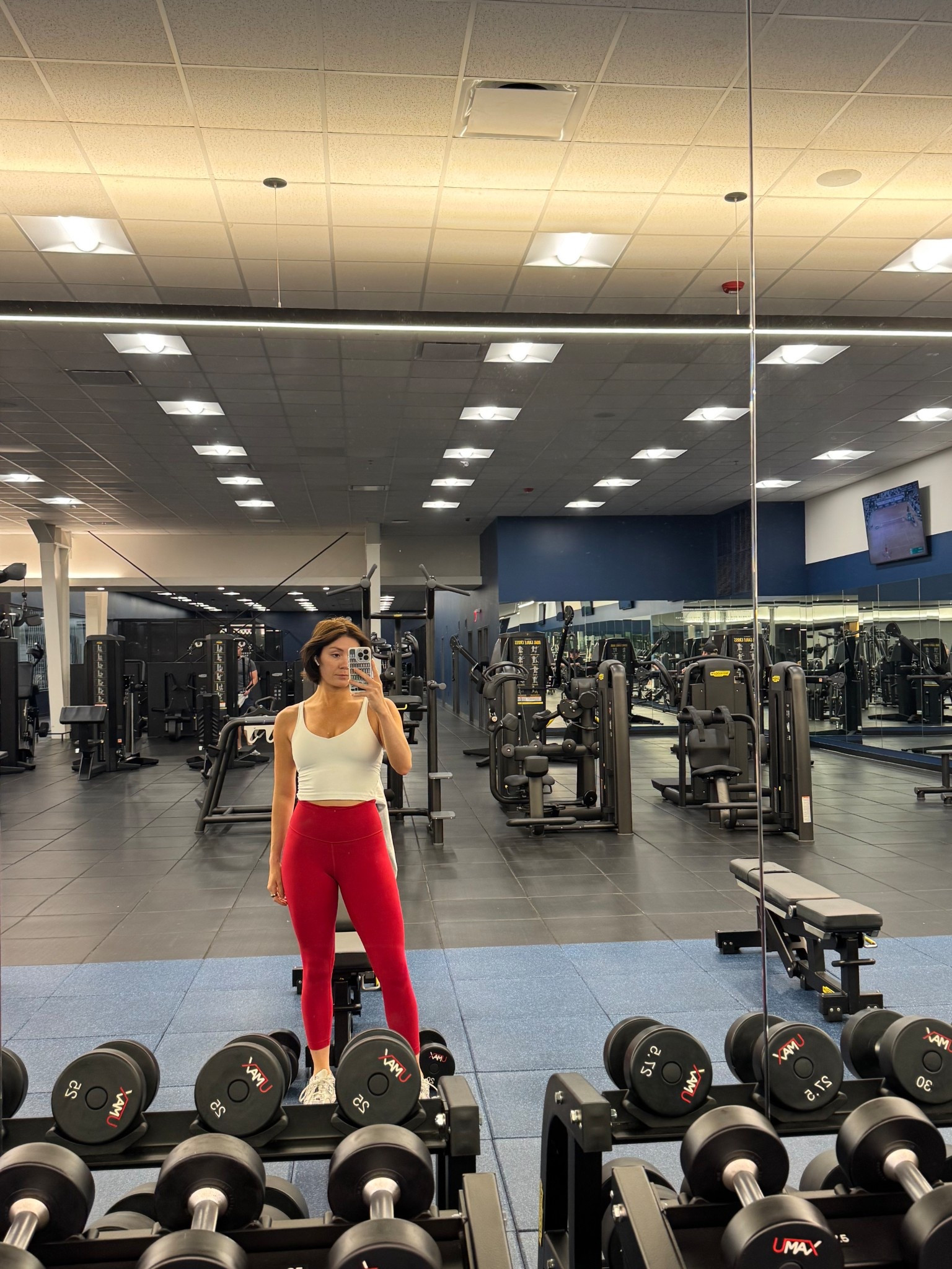 My go-to lululemon workout top and red leggings. Both in size 6!