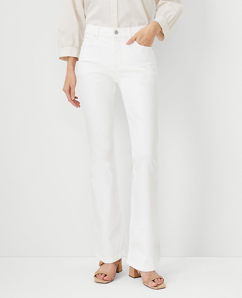 Sculpting Pocket Mid Rise Slim Boot Cut Jeans in White | Ann Taylor (US)