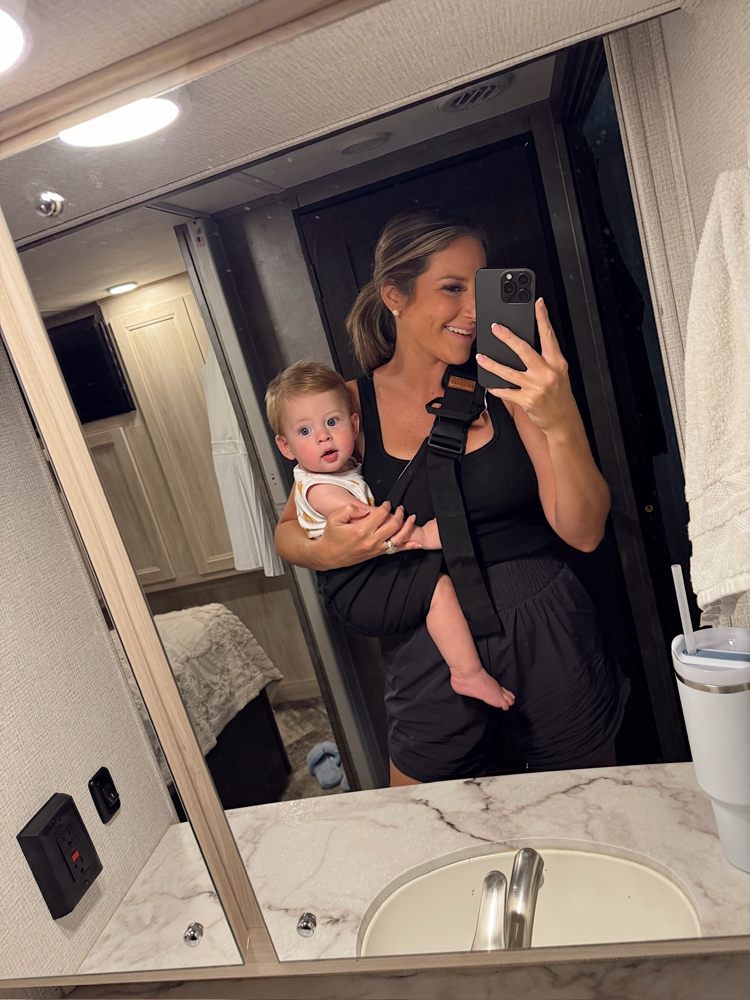 Camping ootd! In a medium tank and medium shorts - fits tts. And Storm is chilling in this awesome baby sling carrier that comes in a 2 pack! 

#LTKStyleTip #LTKFamily #LTKBaby