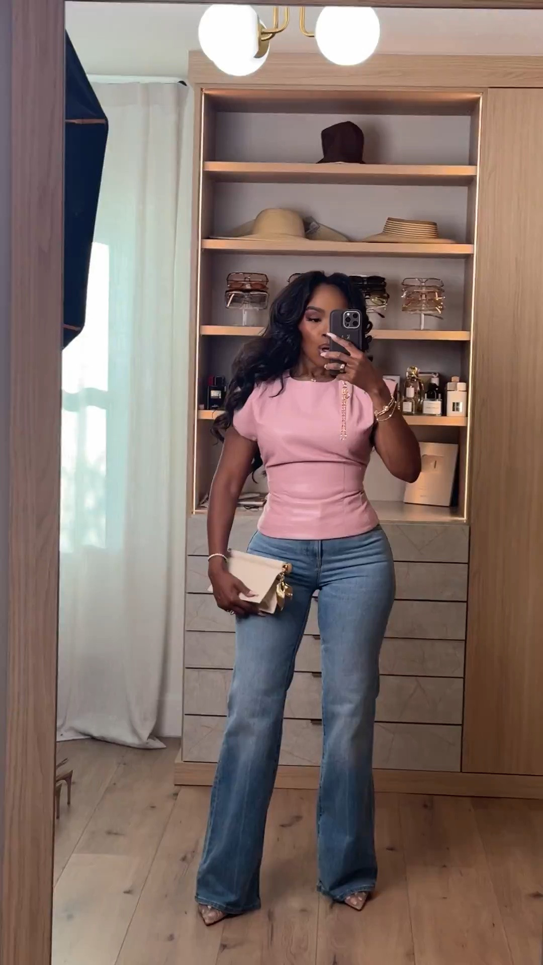 Hi babes! 🎀

This soft pink + light wash denim combo is giving feminine, polished, and effortless all at once. The structured shoulder detail on this top instantly elevates the entire outfit while the relaxed denim keeps it wearable and easy for everyday styling.

I love pairing elevated tops like this with simple denim because it creates that balanced “put together without trying too hard” vibe. Added the neutral heels + clutch for that luxury-inspired finish that makes the whole look feel expensive.

Where to wear this:
• Lunch dates
• Casual office days
• Brunch with the girls
• Shopping days
• Dinner plans

Affordable hero pieces styled with timeless accessories will ALWAYS outperform overly trendy outfits because you can rewear every piece so many different ways. The cost per wear on looks like this becomes unbeatable.

Everything is linked below ✨

xx Kira | IG: KirasFashionFinds

5’4 | 140LBS | 34D-27-40 | size small | jeans 27

#LTKgrwm #LTKootd #LTKvlog