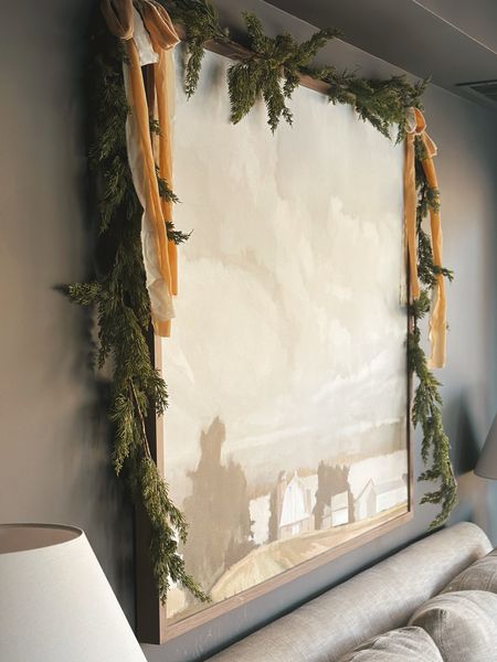 Garland around artwork is a nice seasonal Christmas decor touch as well 🌲 #garland #ribbon

#LTKSeasonal #LTKhome #LTKHoliday