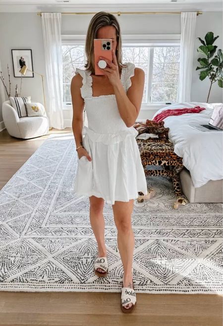 How cute is this Revolve flirty dress? I also have it in a tan/copper color. I’m wearing a small. I loved pairing it with these Bloomingdale’s Slide Sandals. 

#LTKStyleTip