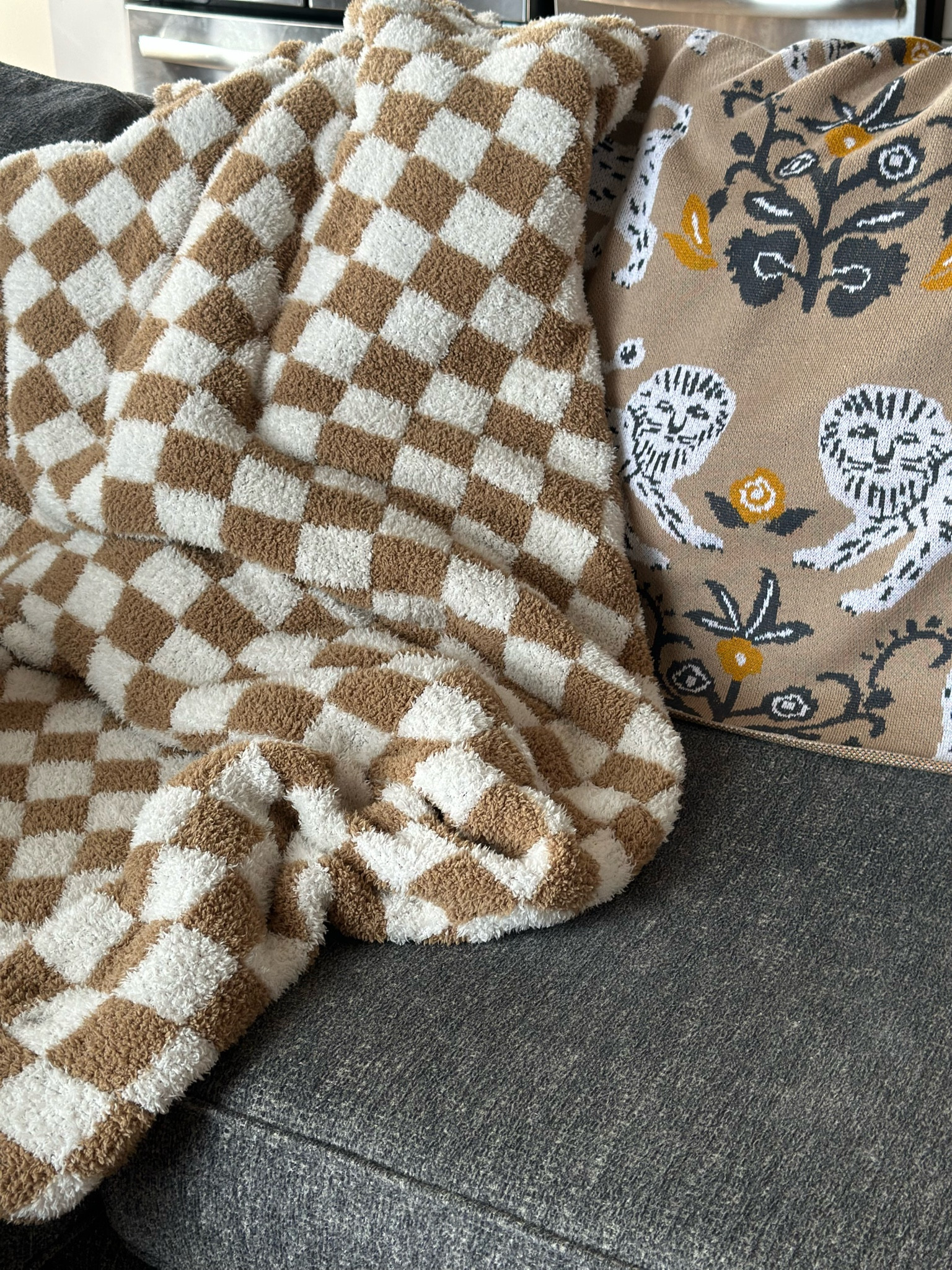 my favorite throws! the checkered one is a barefoot dreams “dupe” but is still originally priced over $100 and is on sale for $38! 

#LTKunder50 #LTKGiftGuide #LTKhome