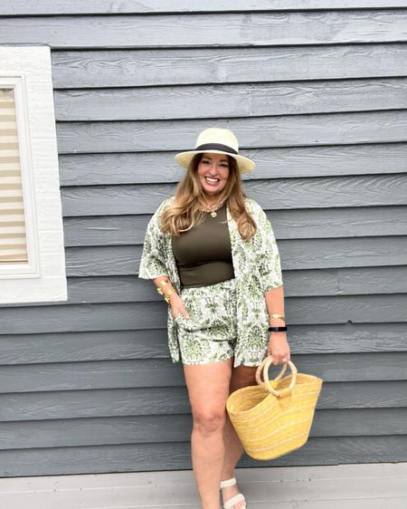 An adoral short set! I love the pull on shorts that feature pockets and the casual robe over-shirt. The loose fit is so comfortable. My hat and bag are wonderful vacation summer accessories that are also linked. 

#LTKtravel #LTKstyletip #LTKFestival