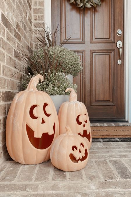 Front door Halloween/fall decor with cement look-for-less planters 

#LTKSeasonal #LTKhome