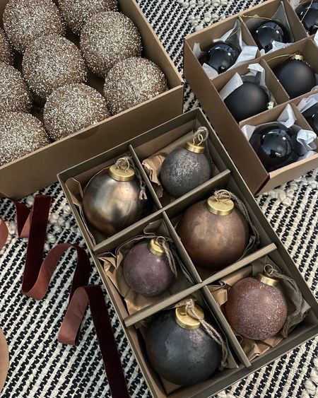 Christmas tree and holiday decorations …Flocked tree with round planter base 
Browns, blacks and rust ornaments I’m loving again this year…the crate and barrel ones are my absolute favorite!
Modern organic, neutral modern decor

#LTKSeasonal #LTKHoliday #LTKstyletip