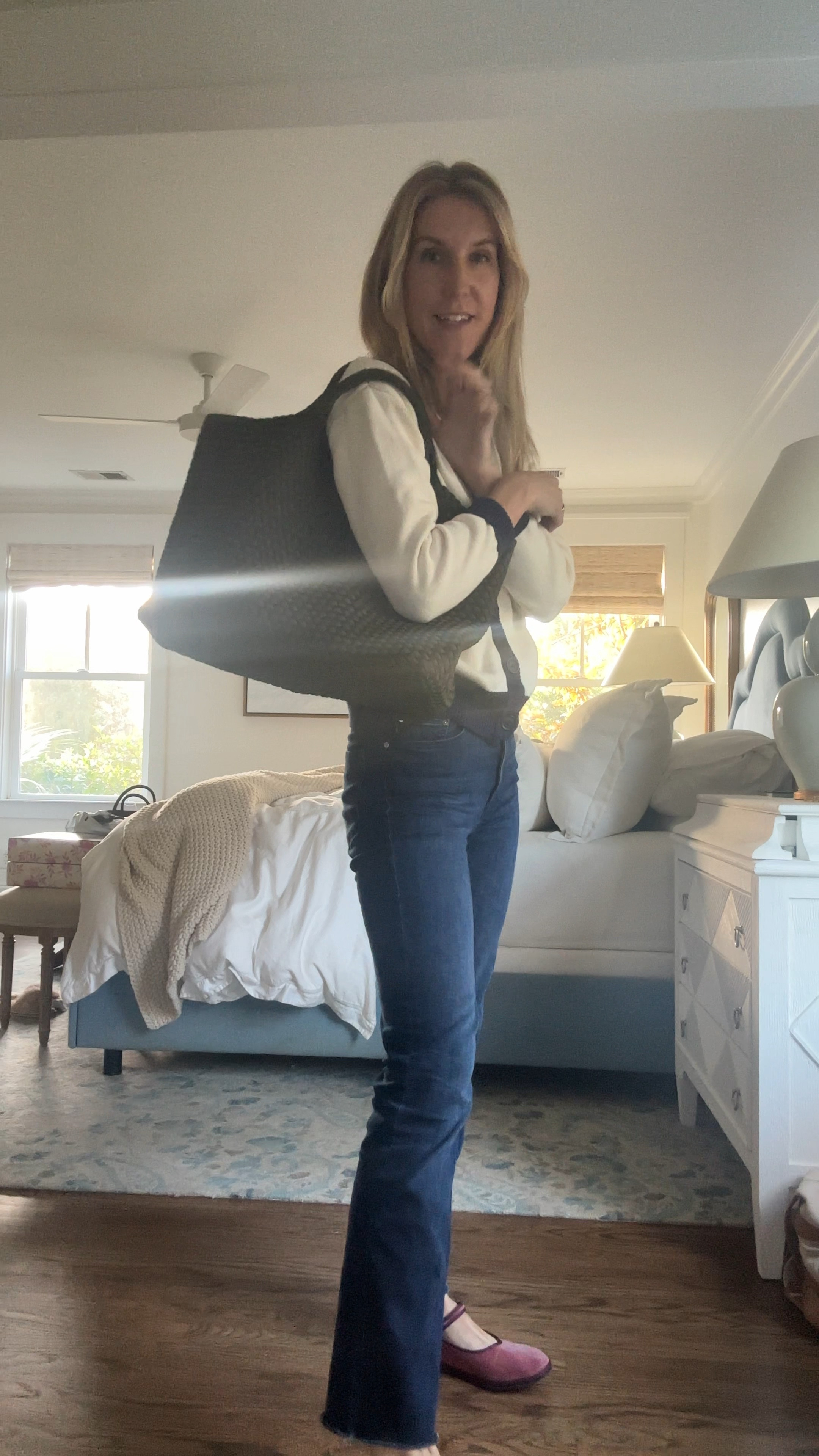 The Naghedi tote in large is one of the best travel, work or weekend bags, especially with kids! I have the olive color and love that it stretches to fit over my shoulder too. 

Flats- size up one. I wear the size 39 and wear a size 8 shoe

#LTKTravel #LTKWatchNow #LTKStyleTip