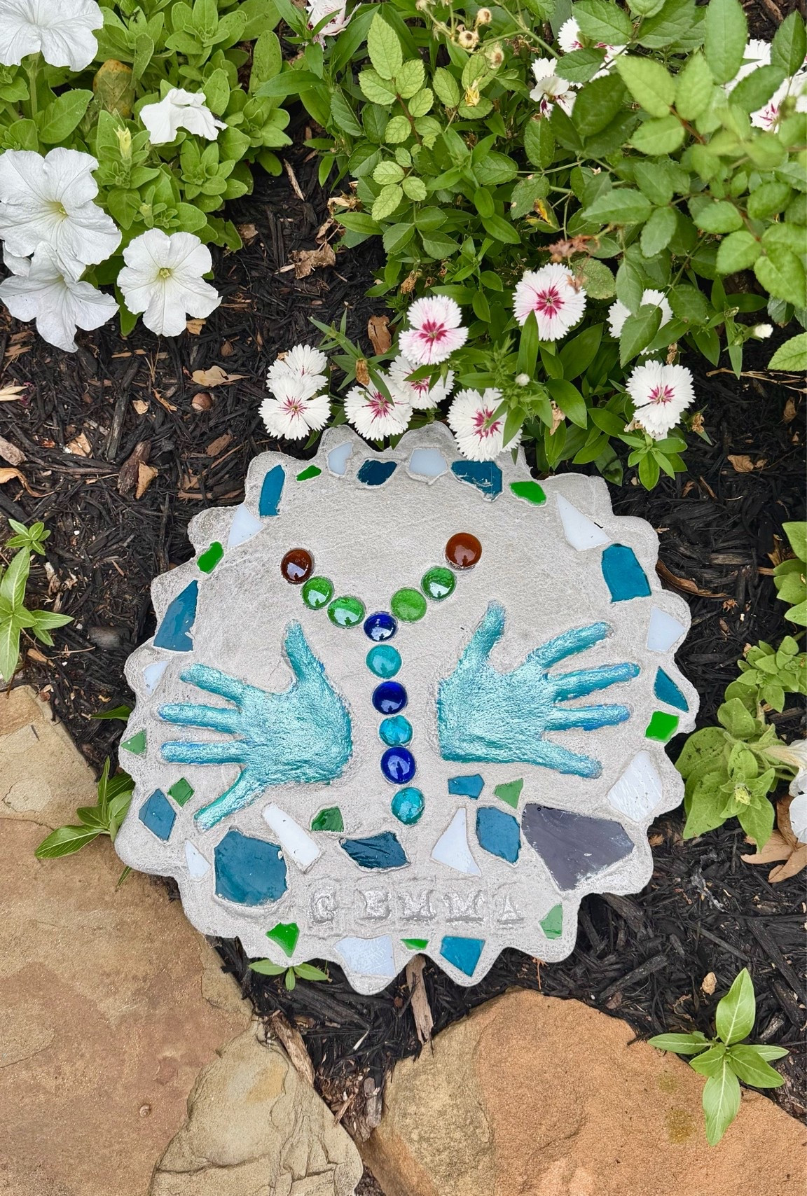 Mother’s Day gift 
Garden stepping stone 
DIY garden stone 
Metallic paint

#LTKMothersDay #LTKKids
