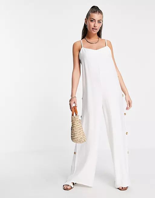 ASOS DESIGN strappy button side linen jumpsuit in white | ASOS | ASOS (Global)
