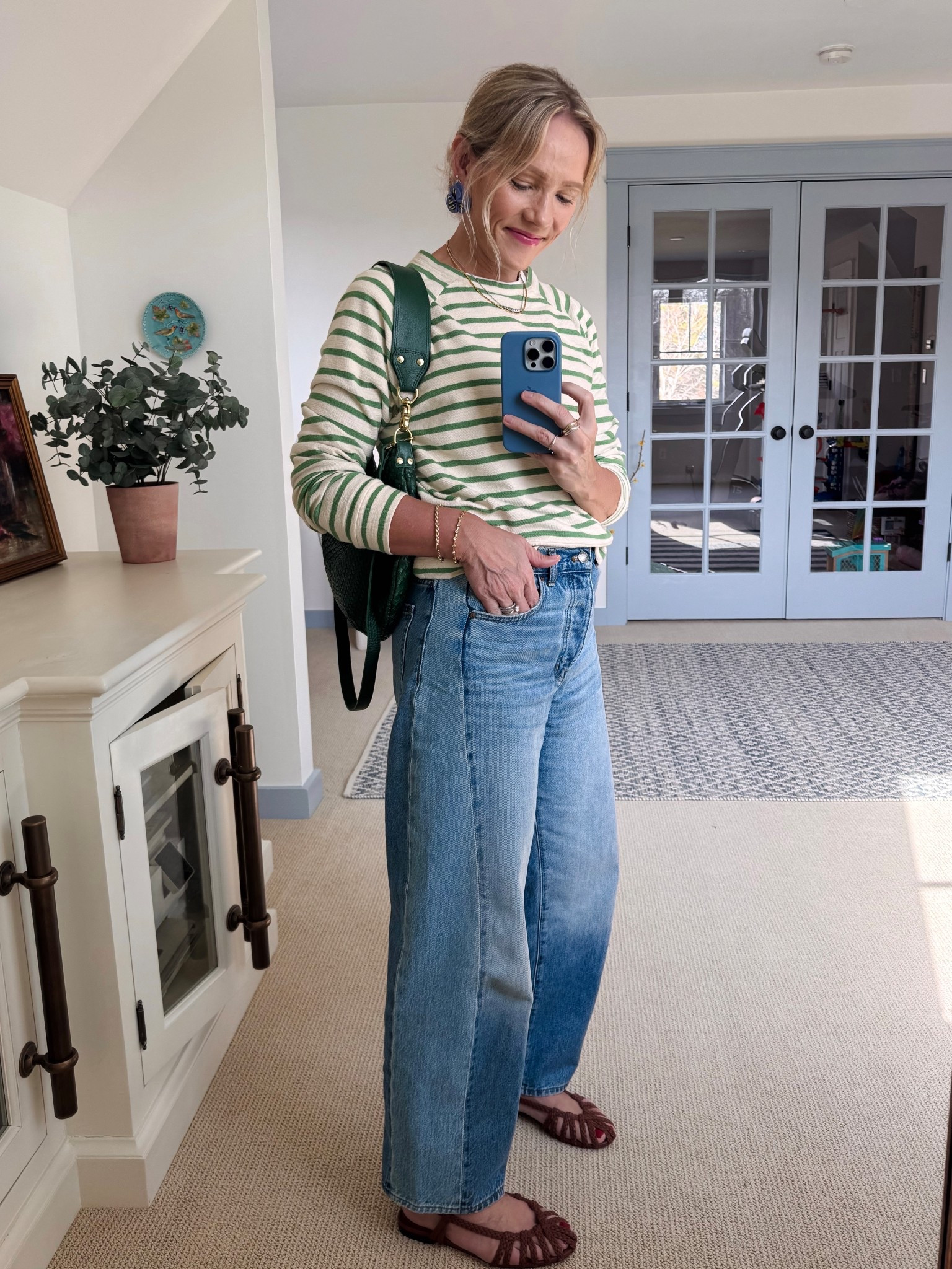 Monday mom outfit 💐✨check out more in the outfits section on clairelately.com 

MADEWELL PIECED DENIM ~ a fun twist on their bestselling barrel-leg style, a mid rise easy fit, I’m wearing my regular size in standard length (5’3”)

KULE STRIPE SWEATSHIRT ~ use code SUMMER15, lightweight but high quality, perfect Summer layer. wearing my regular size small. There are matching shorts but I did return them since they were a bit short for my everyday style. Also own and love this tee and this terry dress/cover-up.

MADEWELL PERFECT WHITE TEE ~ a favorite! comes in a handful of colors, I’m wearing my regular size small

CLARE V MOYEN MESSENGER BAG ~ in evergreen, use code LESPRING15

TUCKERNUCK EARRINGS ~ mine are from last year but linked newer styles, use code YOUROCK for 20%

DORSEY GOLD & CURVE NECKLACES ~ my most work dorsey pieces. subtle, beautiful, and go with everything

TUCKERNUCK COGNAC SLINGBACK SANDALS ~ have these on repeat lately! Take your regular size and use code YOUROCK.

BAUBLE BAR 18K GOLD BRACELET ~ I wear this pretty much every day 

TELETIES HAIR TIE ~ I use the tiny for my thin hair to prevent breakage

MERIT LIP COLOR – flush balm in LeBonBon

SANTAL FRAGRANCE – use code MOM20, have been wearing this on repeat lately, it’s intoxicatingly good

Xo, Claire 

#LTKxMadewell #LTKSeasonal #LTKStyleTip