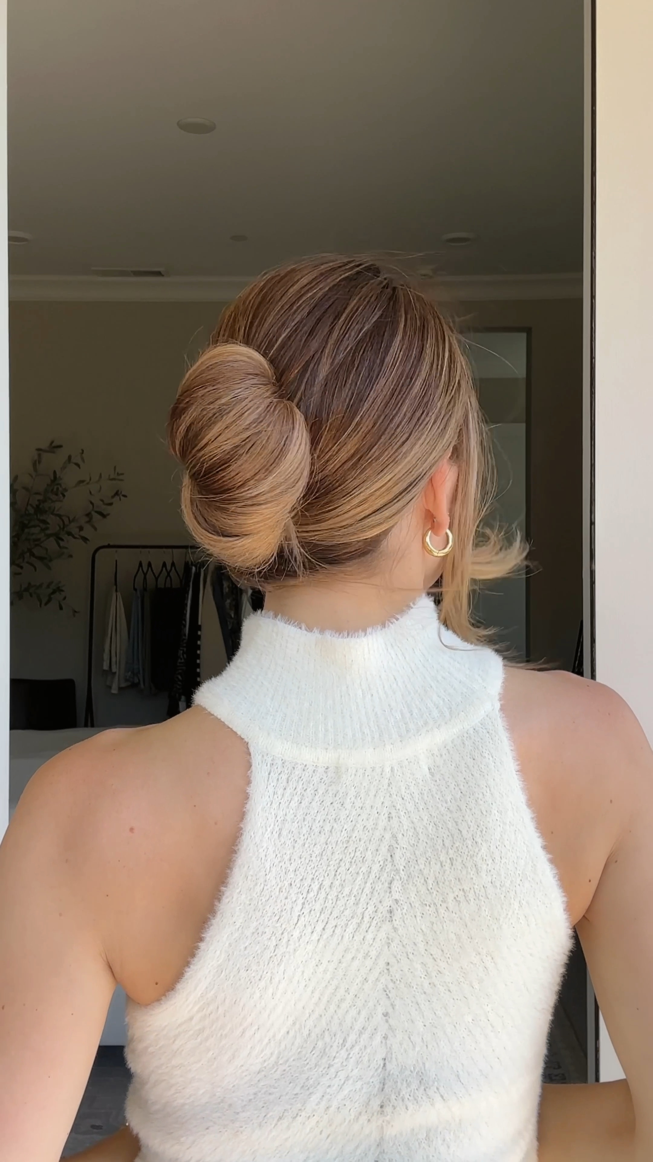 Claw Clip Bun Tutorial

Here’s a fun bun using a three-prong claw clip!

Gather your hair into a low ponytail.

With your other hand, open the claw clip as wide as possible.

Place the claw clip on top of your ponytail.

Wrap the ponytail over the claw clip, then place it inside the open teeth while twisting the clip toward your scalp. 

Squeeze to secure.

Grab the remaining tail with your other hand, open the claw clip, and place the ponytail inside.

Continue wrapping the ponytail around to the other side, then open the claw clip once more and tuck the ends inside and under the bun.

Looks so cute with a sweater! I can’t wait to wear this hairstyle in the fall 🍂

#LTKBeauty