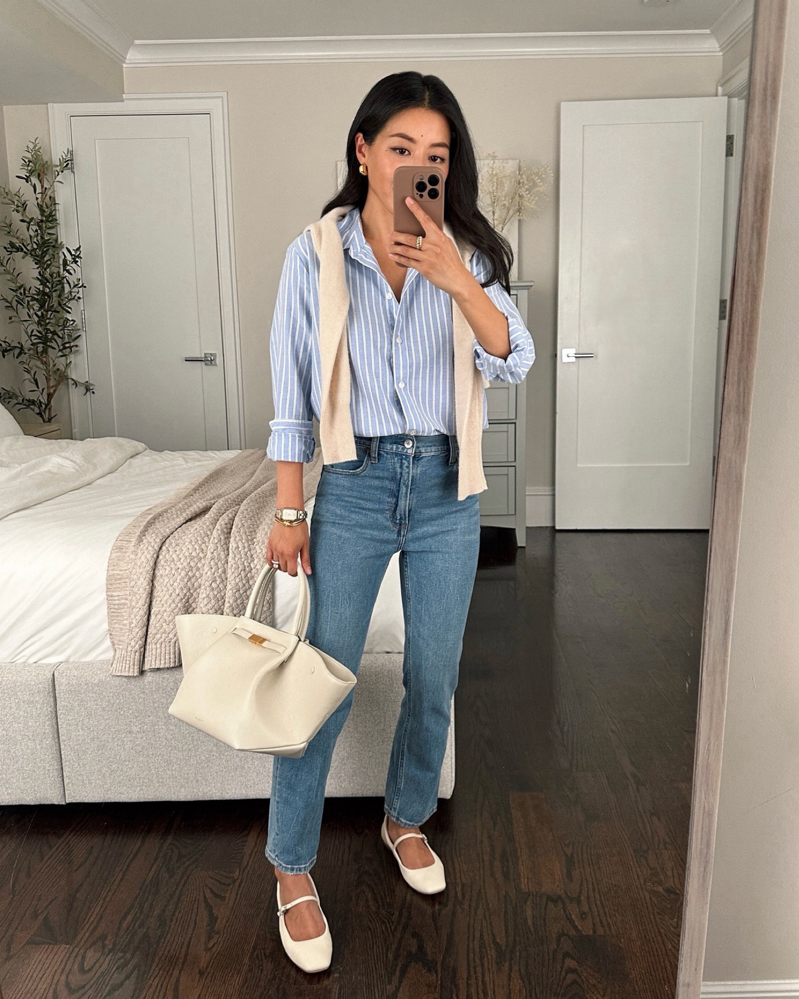 Flats are restocked in this color! And these are One of the best petite friendly AF jeans on sale

• High Rise Ankle jeans 24 short - wash is “medium.” classic slim straight fit, I’m 5 ft tall and prefer the short (inseam measures 24.5” ) which works great for flats sneakers, heels, and loafers. 

• linked a similar stripe shirt  for Everlane friends and family sale that I own and would recommend . 

Their silky cotton shirt is a very airy and light cotton shirt that makes a great layering staple. I take size xxs 

• Demellier bag 

• Dolce vita flats 5.5 

• jcrew shrunken cashmere sweater is one of the most petite friendly cashmere sweaters I’ve found. I size up to Xs since it’s a slightly cropped fit

#LTKSaleAlert #LTKSeasonal #LTKFindsUnder100