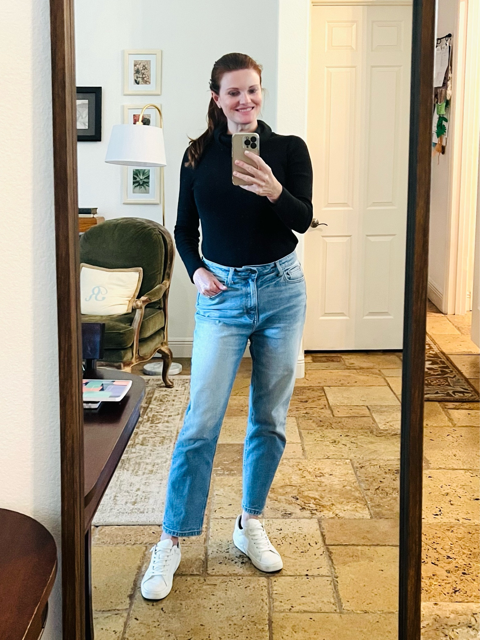 Keeping it basic with a black sweater tucked into loose jeans. My  sneakers are super comfy!!