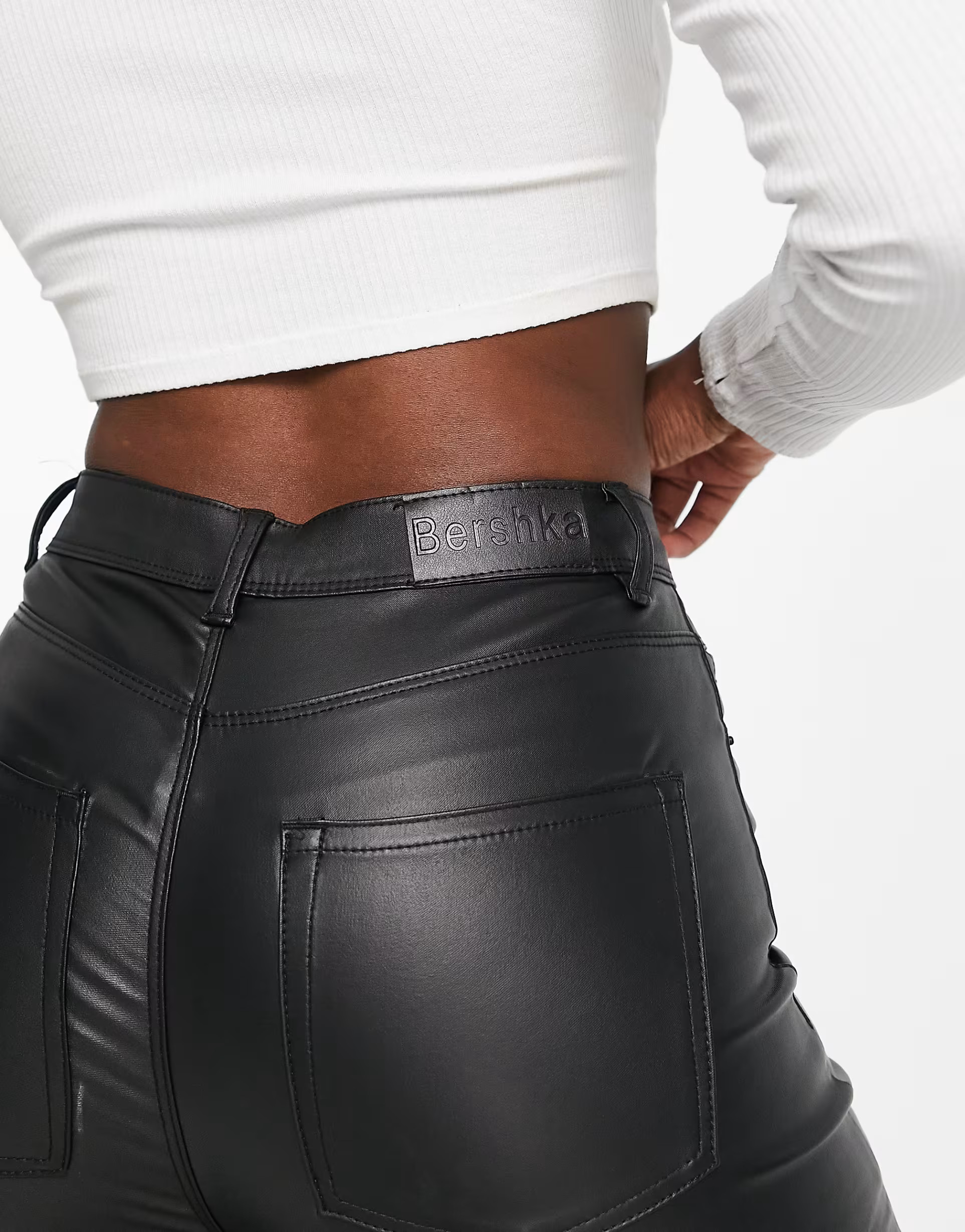 Bershka coated faux leather skinny pants in black | ASOS (Global)