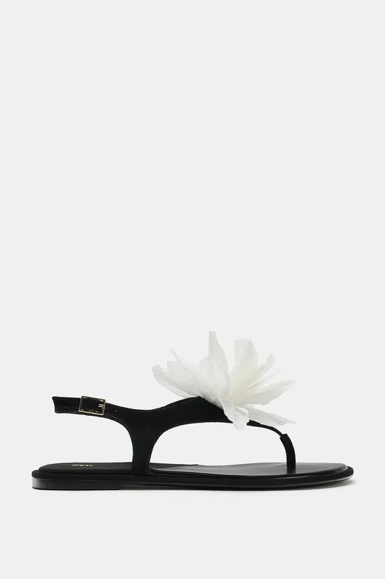 Flat sandals. Front strap with flower detail. Ankle strap fastening. Rounded toe.Sole height: 1 c... | Zara US