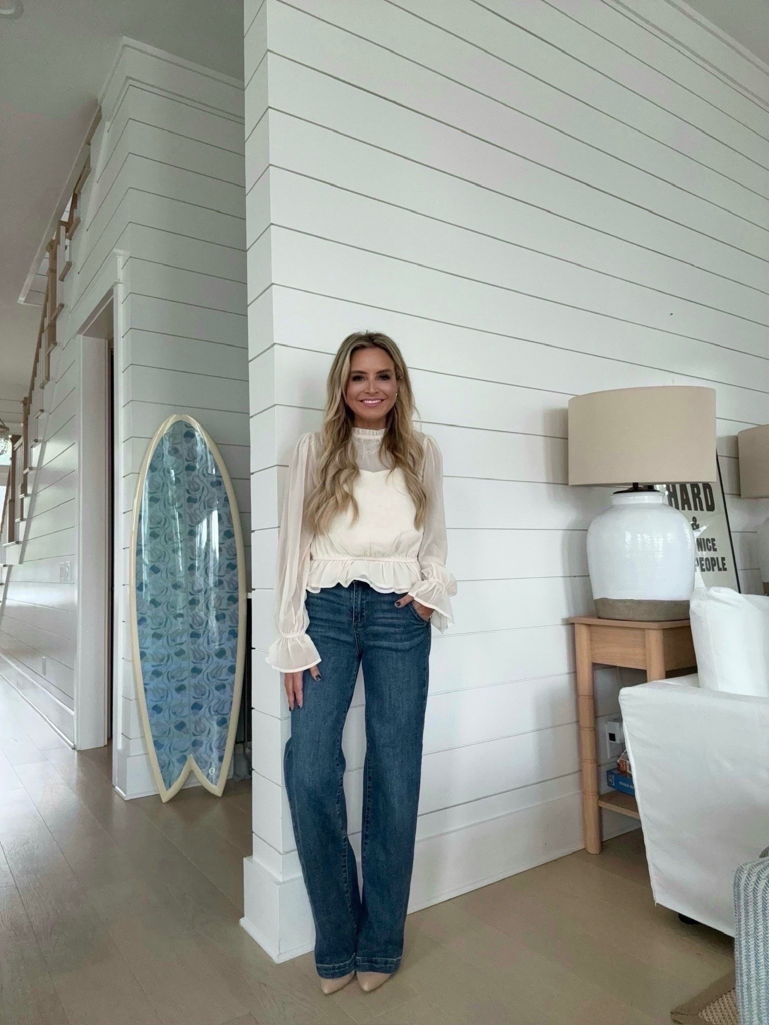 Loving this ruffle from the Avara holiday collection. So cute with jeans and booties. Top wearing XS and size 24 jeans. 

#LTKootd #LTKHoliday #LTKSeasonal