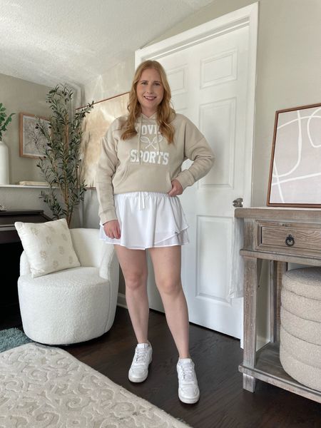 Love & Sports All Gender Pullover Graphic Hoodie, S-XXXL (wearing a small, it runs big) with a white pleated tennis skirt (size large)

#LTKfitness #LTKfindsunder50 #LTKshoecrush