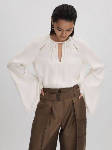Gracie
                Cut-Out Flute Sleeve Blouse | Reiss UK