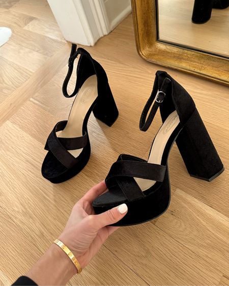 Kat Jamieson shares classic black heeled sandals. 

#LTKHoliday #LTKshoecrush #LTKfindsunder50