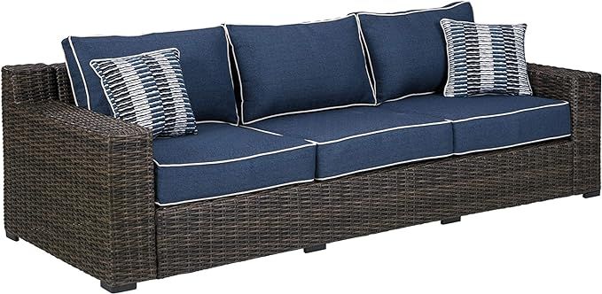 Signature Design by Ashley Grasson Lane Outdoor Patio Wicker Sofa with Cushion and 2 Pillows, Bro... | Amazon (US)