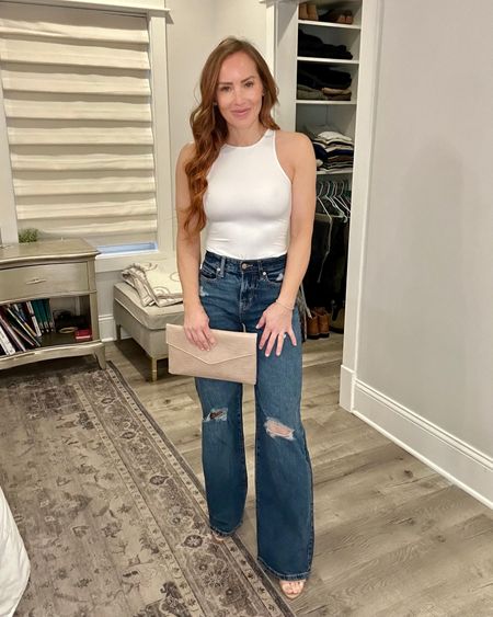These high-rise baggy Target jeans elevated this outfit with their relaxed and flattering fit. And you know I love a good bodysuit 🫶🏻 This one is from Amazon for $20

#LTKstyletip #LTKfindsunder100