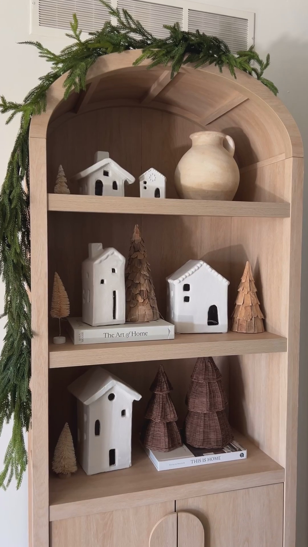 Arched cabinet Christmas decor 

#LTKSeasonal #LTKHoliday #LTKHome