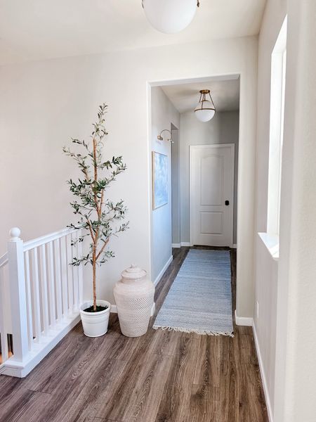 Transform your hallway into a cozy oasis with these simple tips! Add soft lighting fixtures to create a warm ambiance, decorate the walls with family photos or artwork to personalize the space, and don't forget about adding plush rugs for ultimate comfort. Embrace your creativity and make your hallway a welcoming retreat that brightens up your home!✨ #homedecorinspo #hallwayideas

#LTKHome