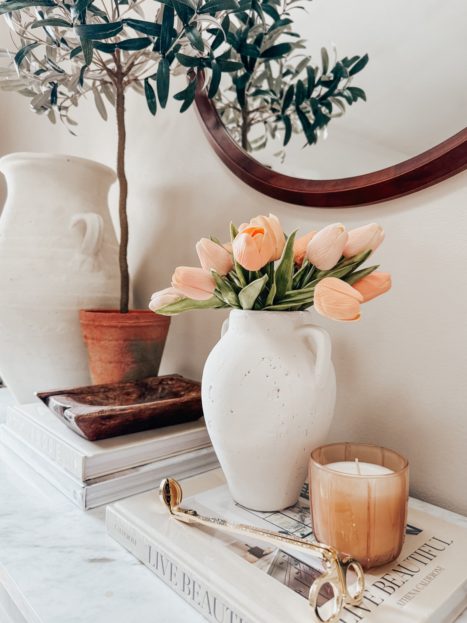 I’m loving these real touch tulips in my entryway; they’re the perfect pop of Spring! The trick to decorating with tulips…you’ve just got to find the perfect vessel! #spring #springdecor #entrywaystyling #tulips #LtKhome #homedecor

#LTKhome #LTKSeasonal