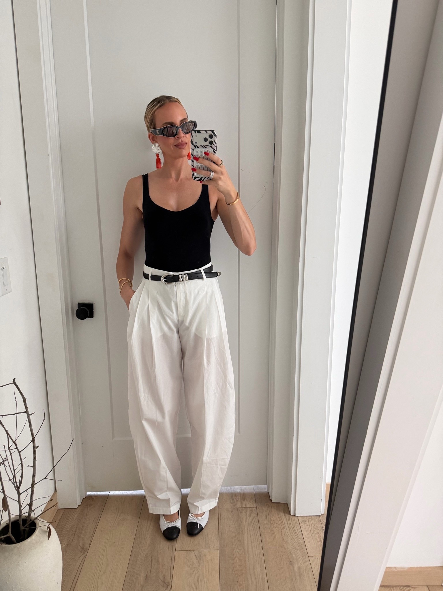 Top is old for free people. I linked some similar ones below. Pants are oversized. Definitely size down. ￼

#LTKootd #LTKTall #LTKTravel