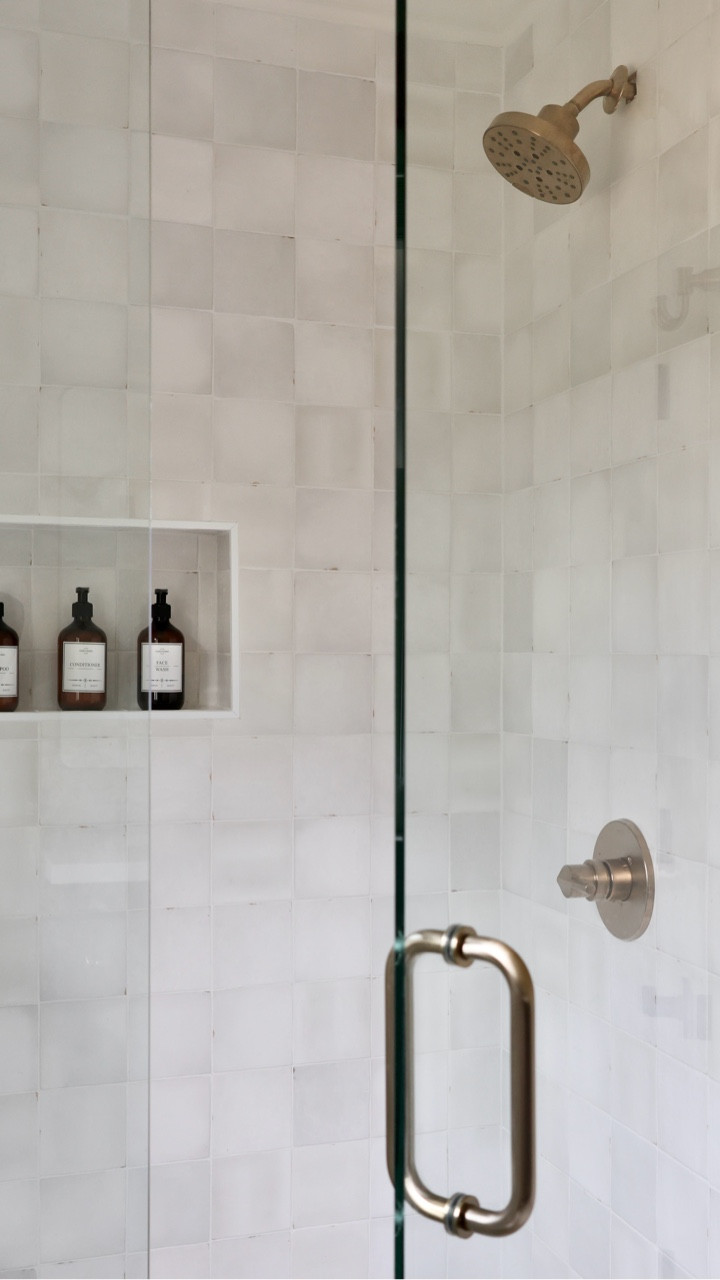 Overwhelmed, over-budget, and overcommitted in the middle of your renovation? Don’t make the same mistakes I did! 

If you’re experiencing one or all of these things you may find yourself just going with the easiest or least expensive option so you can keep pushing forward. You may also just not realize that there are better options out there! This is what happened to me when I completely remodeled my first home while also planning a wedding. 

While I was overall happy with how the remodel turned out, there are so many things that, now that I’ve taken time to think about it (and become a full time interior designer!), I wish I had done differently. 

Instead of a Schluter edge to cover up my shower niche edges I would have chosen a coordinating trim piece or used the same tile and mitered the edges for a much prettier look. The Schluter edge was recommended by my contractor and I had no idea there were even other options at the time! 

I was also overwhelmed picking out tiles for 4 bathrooms so I went with these which match but aren’t very interesting. I wish I had chosen smaller tiles for the floor or maybe a rectangle shape for the walls to add more contrast. 

I had no idea what to do for the mirror so I went with this large piece which matches the gold tones in the rest of the bathroom great but is SO boring. I wish I had chosen two individual mirrors with a little more detail. 

As I’ve moved into the interior design world full time I’ve learned how every little detail and decision can make such a big impact on the overall project. My advice to you - truly think through as much as you can BEFORE hiring a contractor and putting that time pressure on yourself.

And, if you need help with those decisions, it’s always better to hire someone who can guide you in the right direction from the beginning than to regret it later on. 

#atlantainteriordesigner #bathroomremodeling #designtips

#LTKHome #LTKstorytime