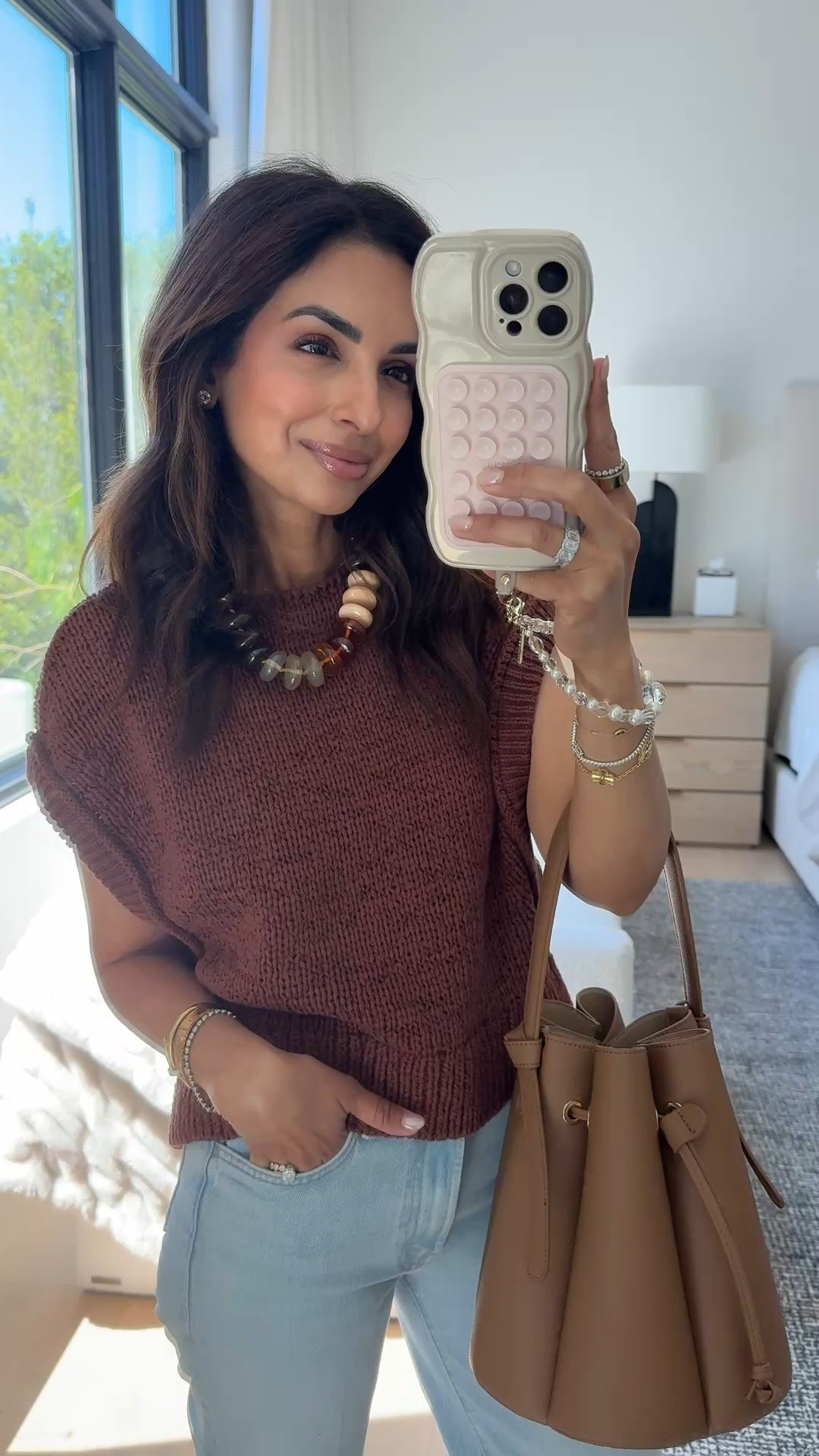 This @Anthropologie  short sleeve sweater is so cute. Comes in 2 other colors and is under $130! Wearing with trendy Mother jeans in size 24 Petite. My sweater is size XXS!

#LTKootd #LTKPetite #LTKSeasonal