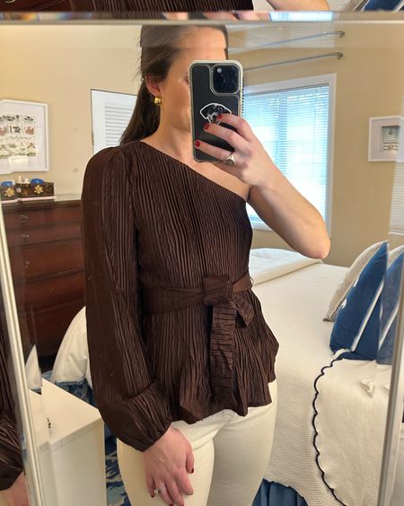 Another cute Lulu’s top find. This one shoulder pleated brown blouse is on trend with the color and the removable tie allows it to be worn cinched or loose! It shipped quickly and will be a great dinner blouse to throw on or would work well for holiday parties. I’m linking some other great dinner or date night blogs options here!

#LTKfindsunder100 #LTKfindsunder50