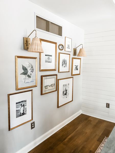 Gold and rattan wall sconce.
Gold frames with mat. 
Gallery frames.

#LTKhome #LTKstyletip