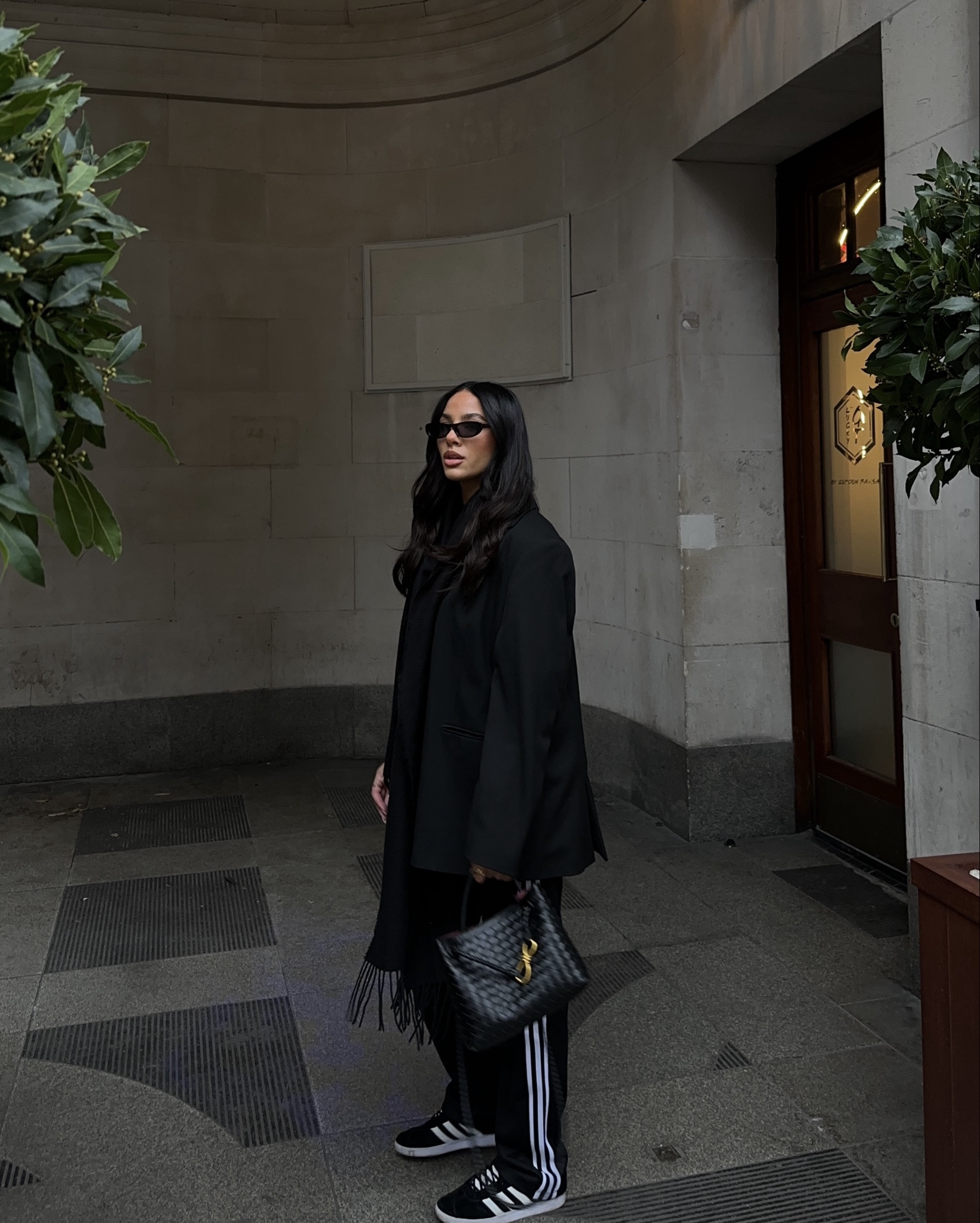 🏷️ all black outfit, all black outfit inspo, black oversized blazer, black gazelles, adidas gazelles, woven bag, black woven bag, chunky scarf, adidas pants 

#LTKuk #LTKgrwm #LTKeurope