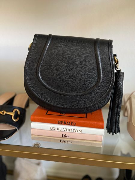 Designer books make the best displays for accessories. These leather bound books by @giginewyork are so chic. Take 15% OFF at checkout with code: HAUTE15
…
#giginewyork #handbags #designerbooks 

#LTKhome #LTKitbag
