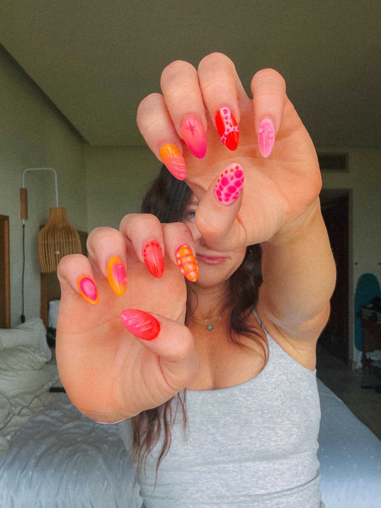 Pink and orange nails - vacation nails 

#LTKgrwm #LTKBeauty #LTKselfcare