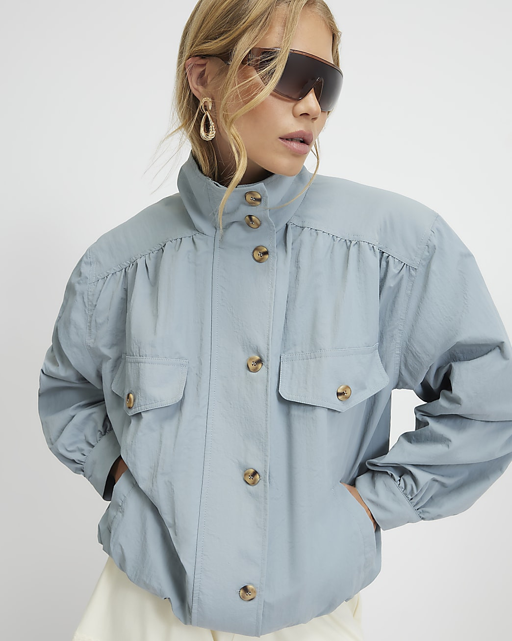 Blue chest pocket funnel neck bomber jacket | River Island UK & IE