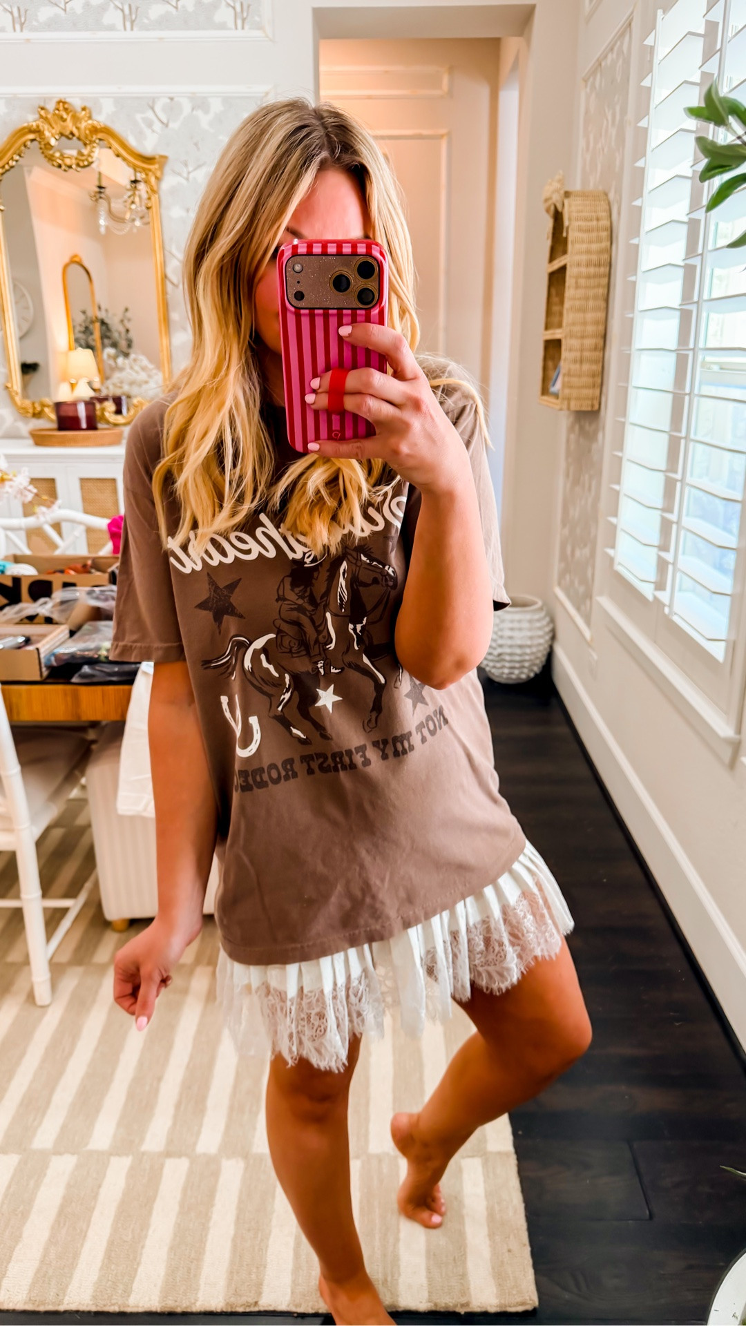 Obsessed with this T-shirt and it’s only $18!! I sized up to a large @pinklily the slip skirt is true to size wearing a medium