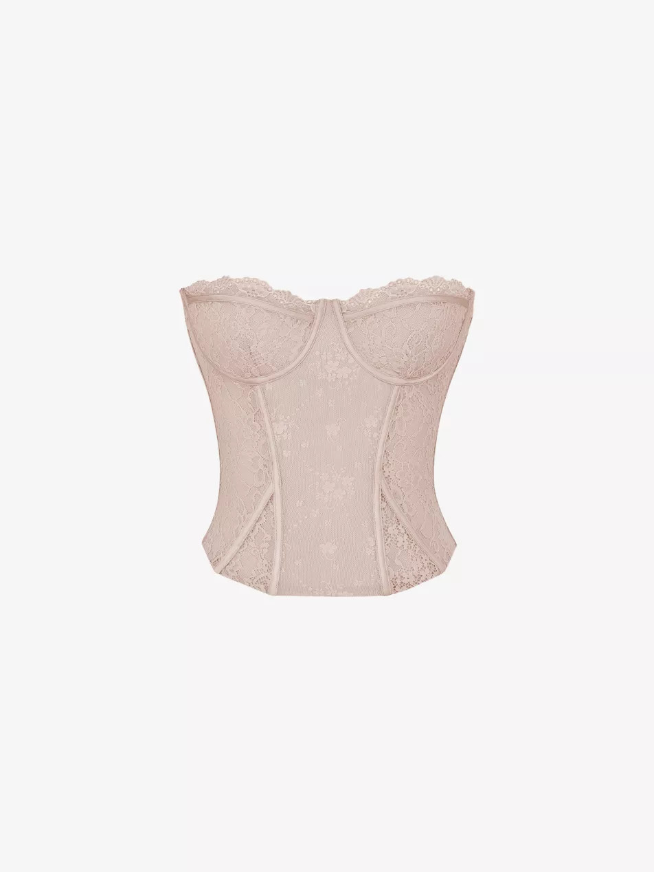 Floral-pattern boned stretch-woven top | Selfridges