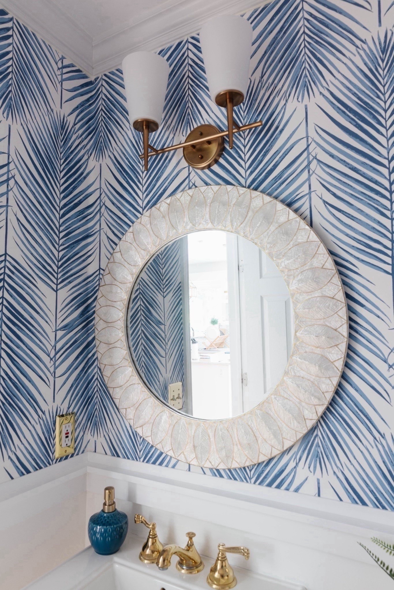 This coastal powder room with blue and white palm print wallpaper is one of my favorite small-space design moments. I love how the bold wallpaper paired with crisp white accents makes the room feel elevated, layered, and designer-inspired. 



#LTKHome #LTKU #LTKSaleAlert