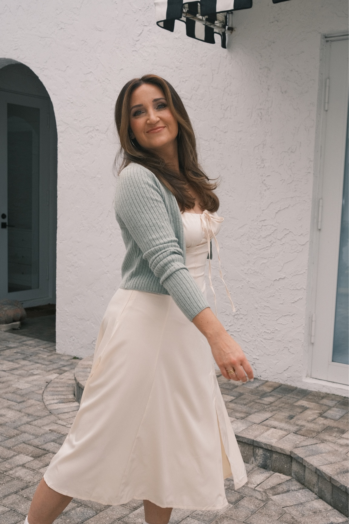 Obsessed with this dress I wore on set! It can work for date night, holiday parties, girls night, family pictures, and can be dressy or casual. Pair it with a cardigan for cooler weather! Loved the sage pop of color but pink would be so cute too 💕

#LTKsalealert #LTKHoliday #LTKfindsunder50