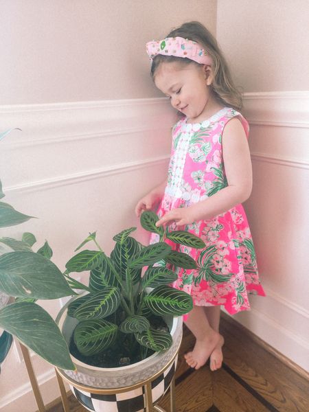 My sweet little girl looking like she's straight out of the 70s She does such a great job caring for all our plants in the house #livinglargeinlilly #lillygirl #kidsclothing #lillypulitzer 

#LTKkids #LTKhome