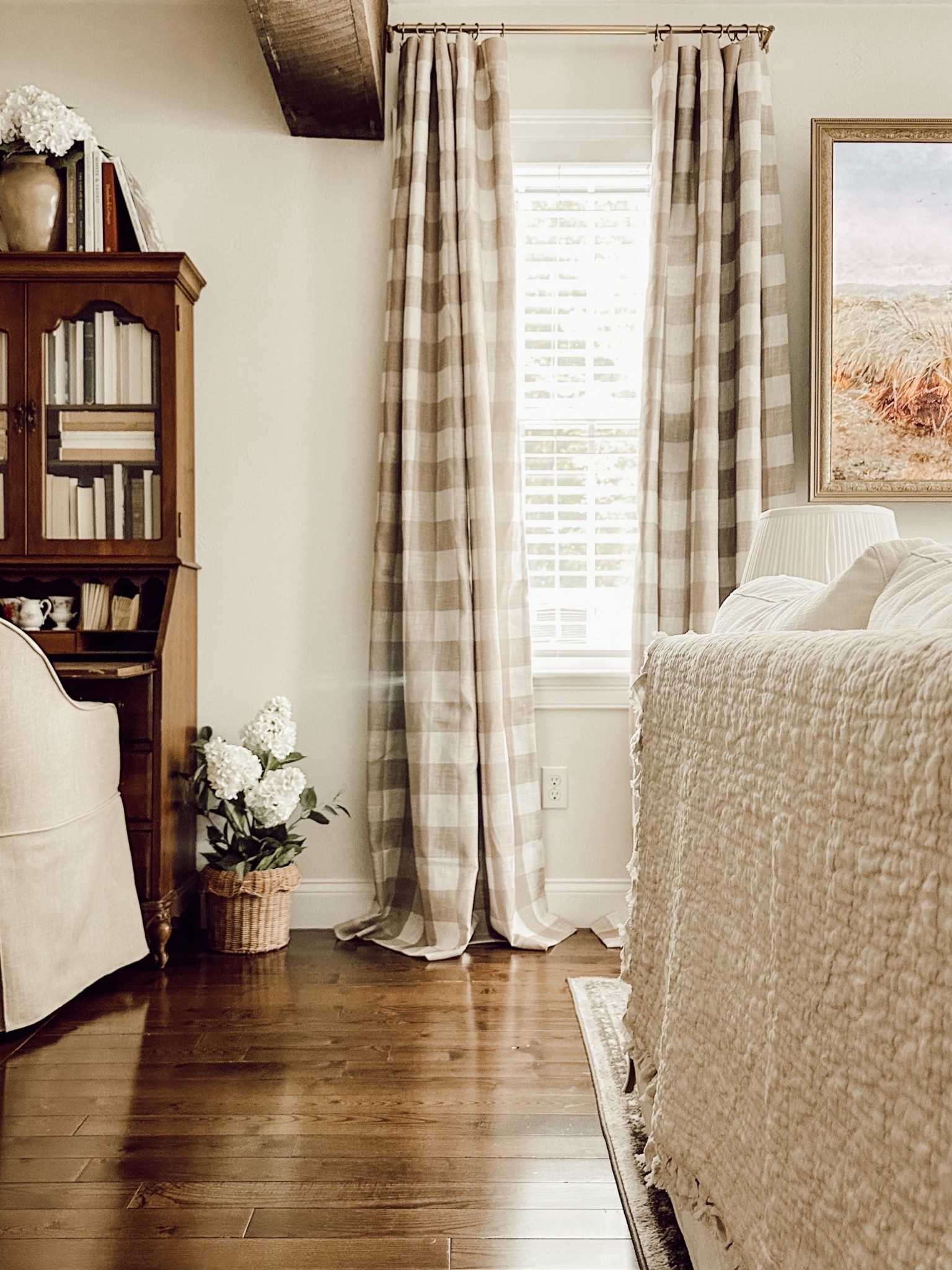 Buffalo check curtains in the living room. We have the linen color. 

#LTKHome #LTKFindsUnder50