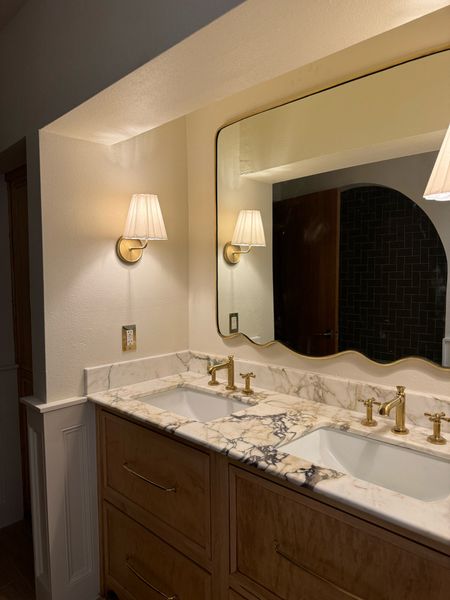 Bathroom sconce and mirror 

#LTKStyleTip #LTKHome